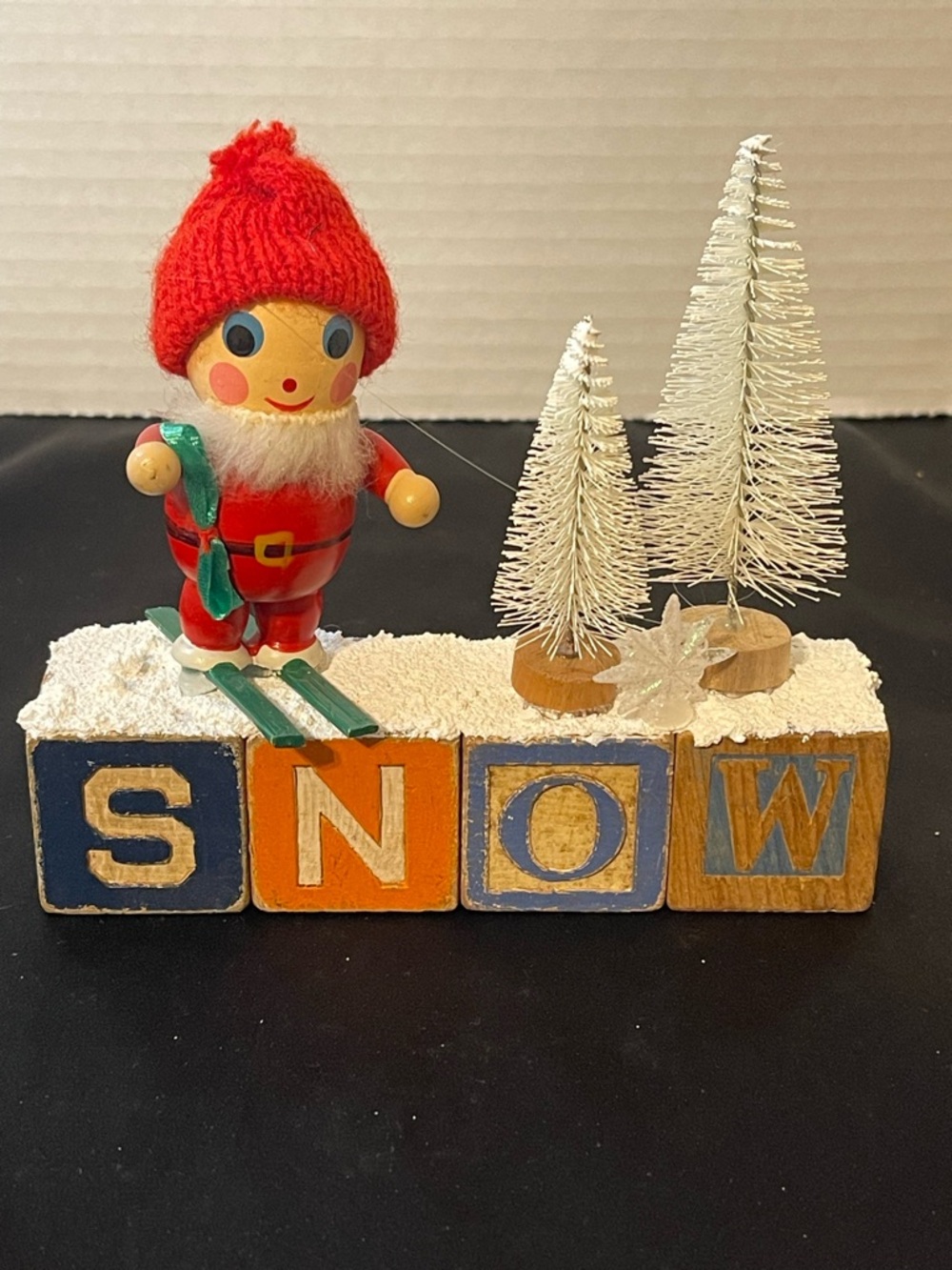 Red Skiing Santa on Snow